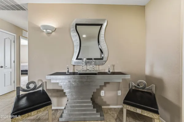 a workspace with furniture and window