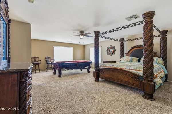 a white bath tub sitting next to a window