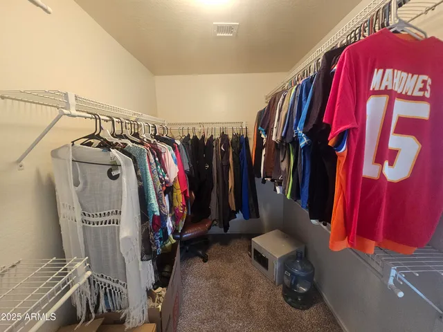 a bathroom with a sink a vanity and a mirror