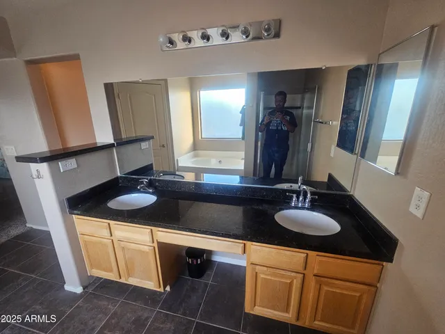 a view of a workspace with furniture