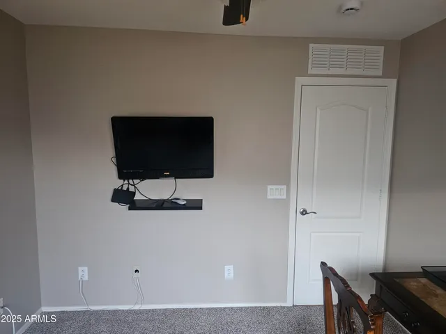 a bathroom with a sink a toilet a tub and shower