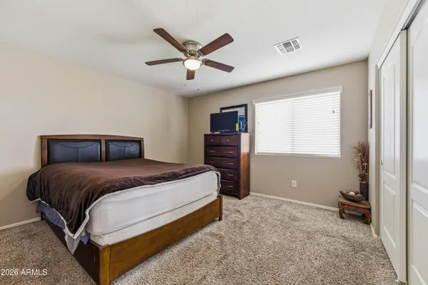 a view of a patio with a yard