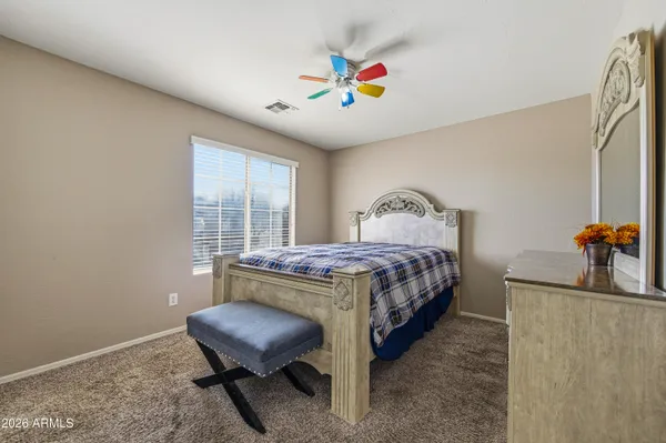 a view of a house with a backyard porch and sitting area
