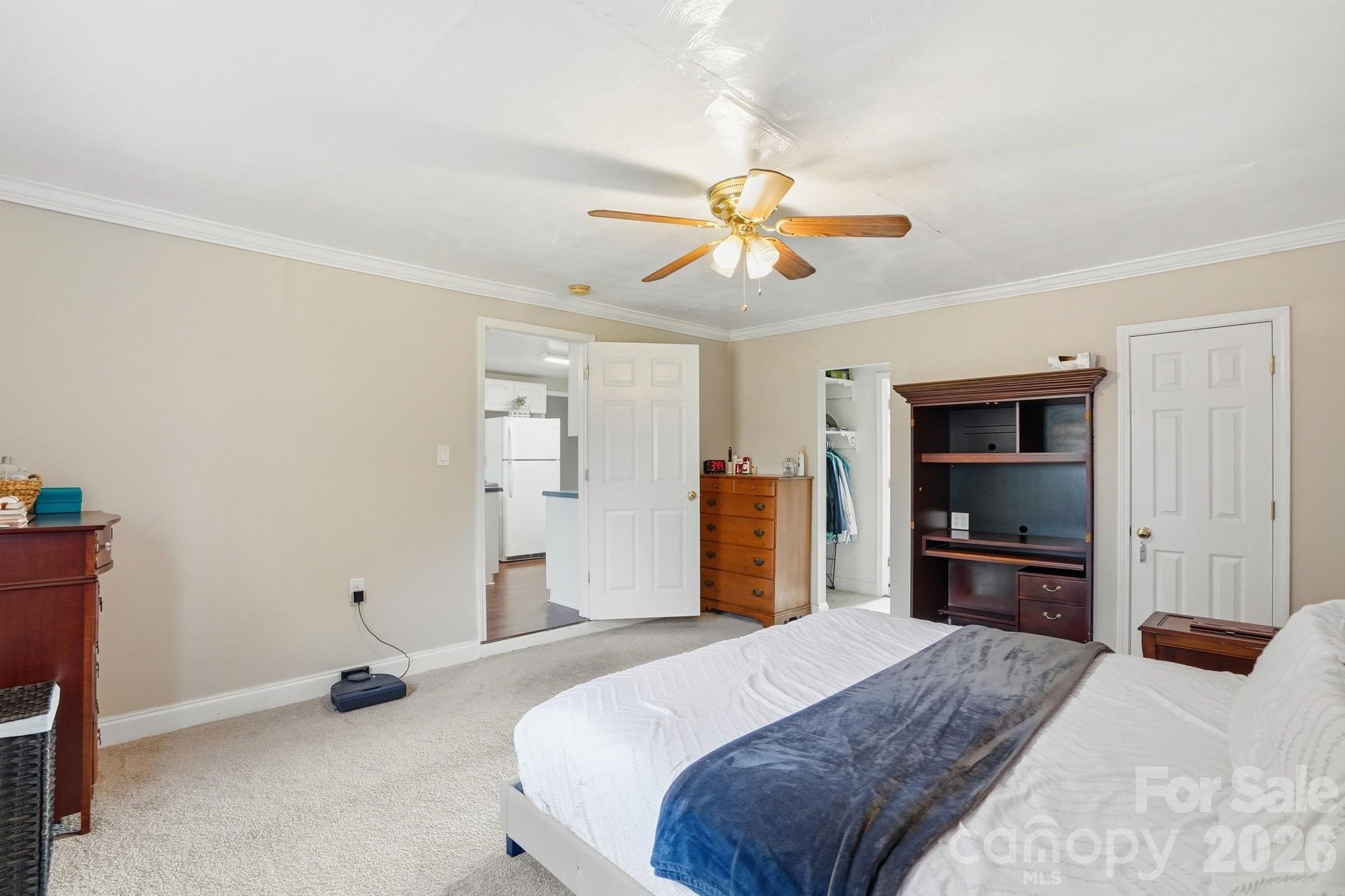 211 Ratchford Farm Road Gastonia, NC 28056 - Photo 11 of 24 a bedroom with a bed and a chandelier