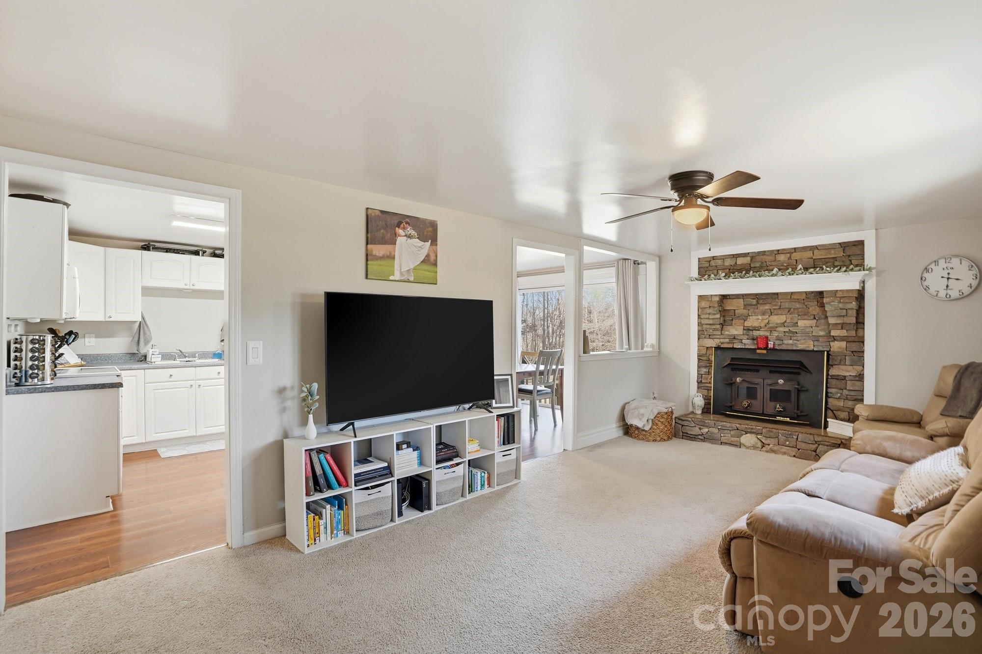 211 Ratchford Farm Road Gastonia, NC 28056 - Photo 2 of 24 a living room with furniture and a flat screen tv