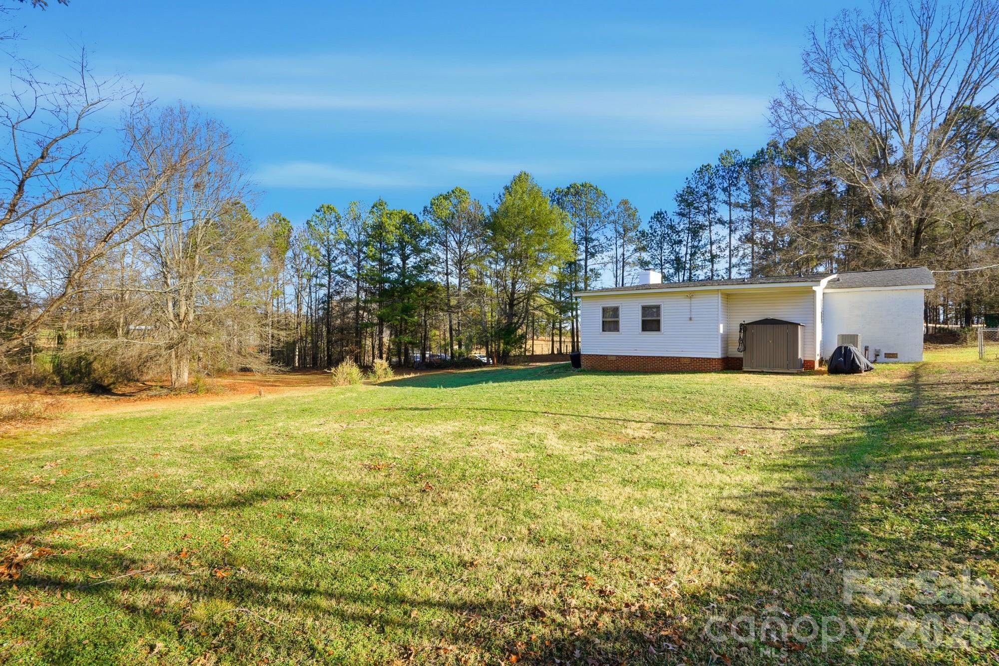 211 Ratchford Farm Road Gastonia, NC 28056 - Photo 22 of 24 a front view of house with yard and seating area