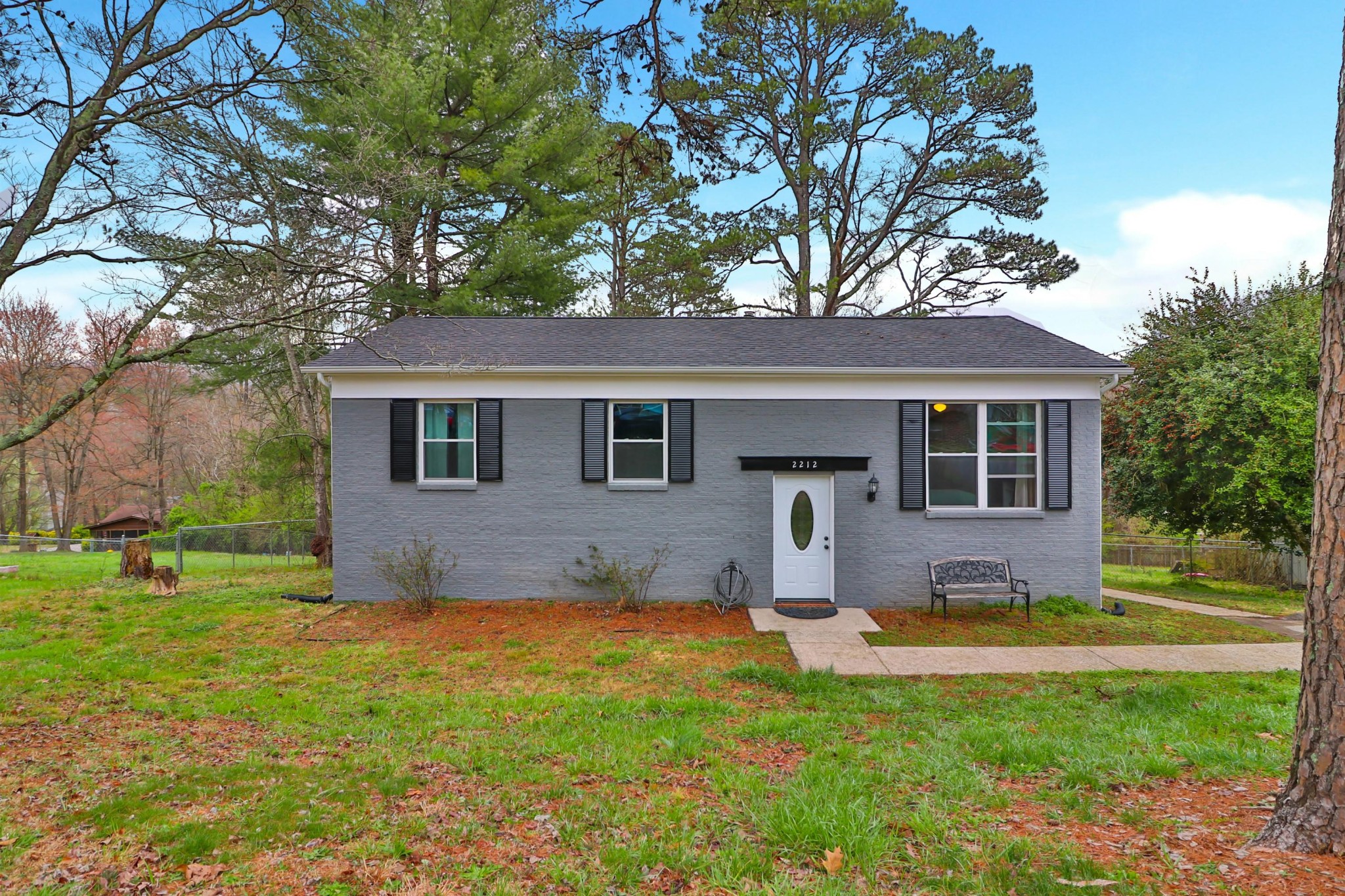 2212 Roundtree Road Knoxville, TN 37923 - Photo 1 of 27 a house view with swimming pool in front of it