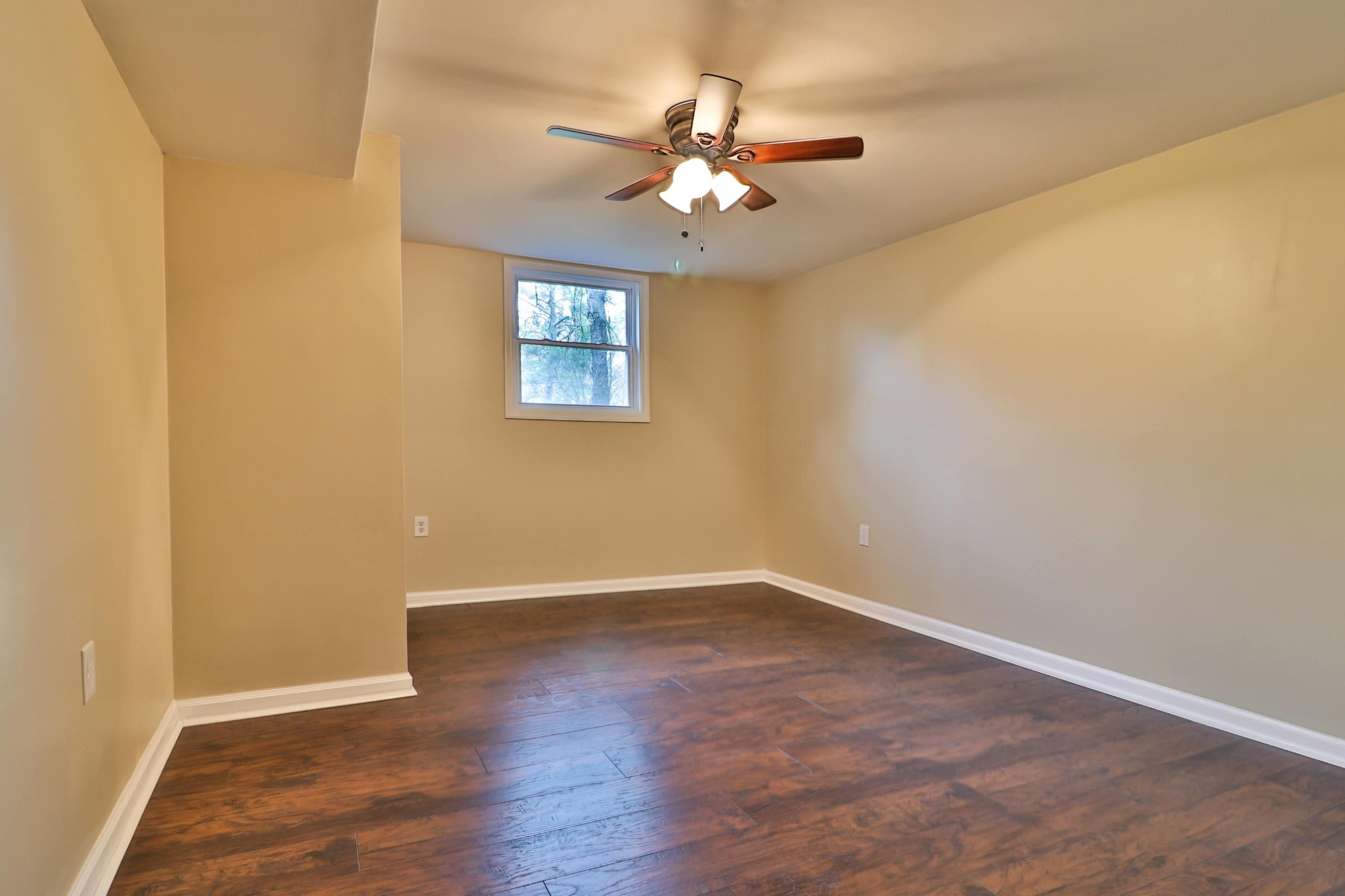 2212 Roundtree Road Knoxville, TN 37923 - Photo 17 of 27 a view of an empty room with wooden floor