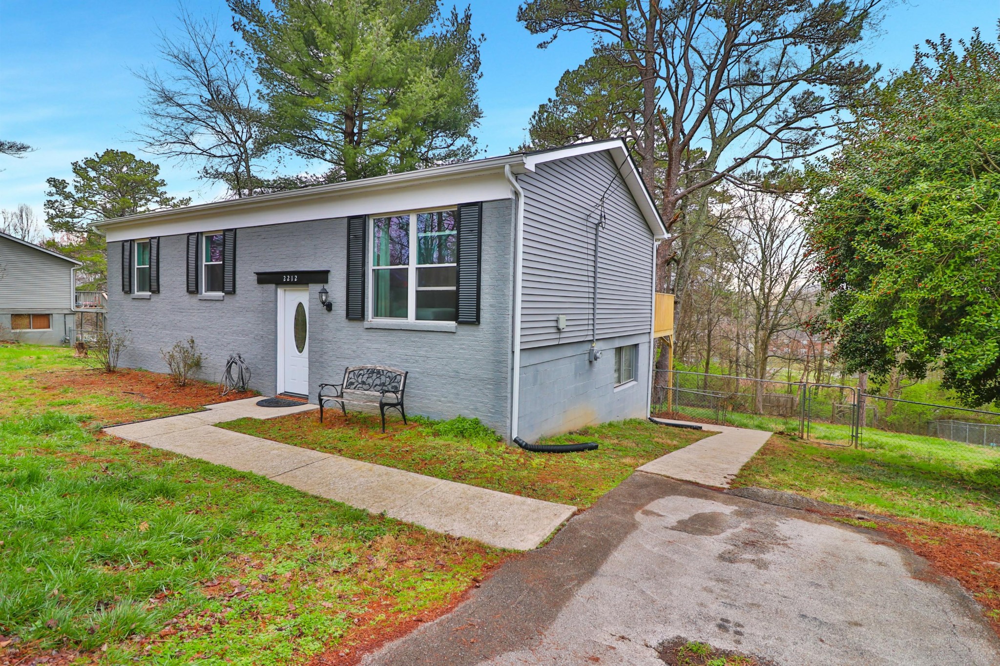 2212 Roundtree Road Knoxville, TN 37923 - Photo 2 of 27 a view of a yard in front of a house with large tree