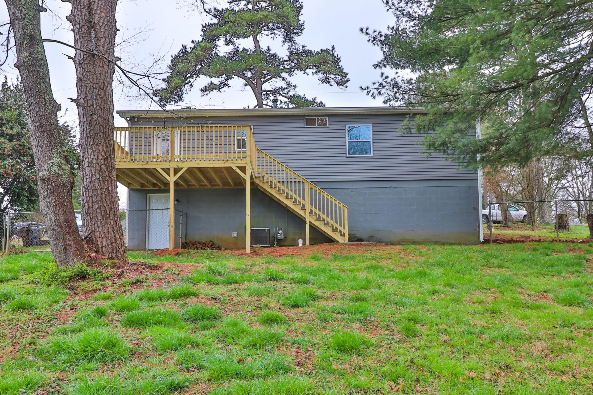2212 Roundtree Road Knoxville, TN 37923 - Photo 23 of 27 a view of a tiny house with a yard