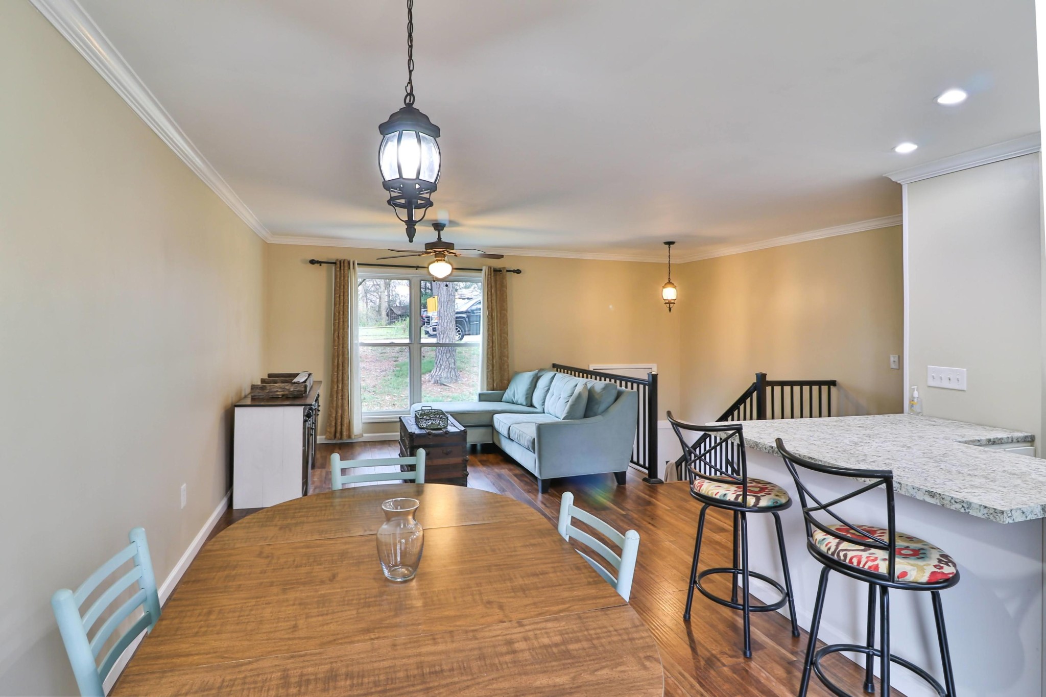 2212 Roundtree Road Knoxville, TN 37923 - Photo 3 of 27 a living room with dining table chairs and couches