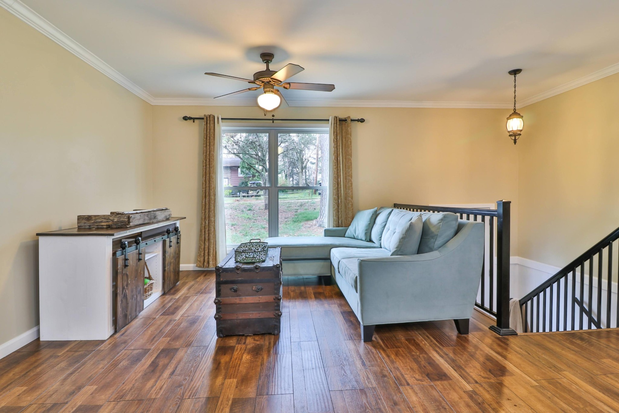 2212 Roundtree Road Knoxville, TN 37923 - Photo 4 of 27 a living room with furniture and a wooden floor