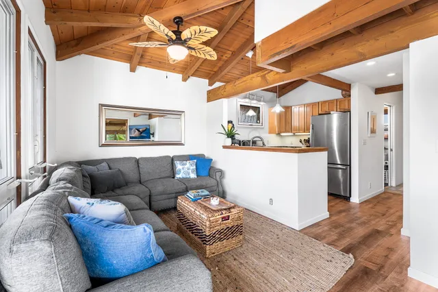 a living room with furniture and a table