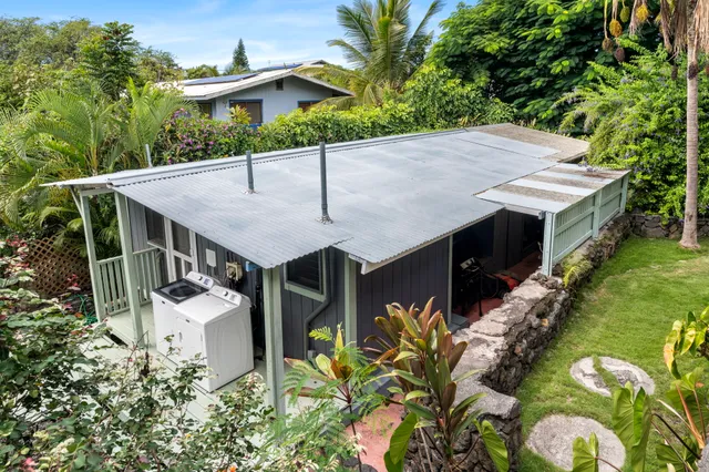 an aerial view of a house having yard