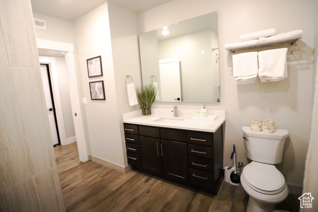 2331 Mesa Road, Unit E3 Moab, UT 84532 - Photo 29 of 71 Bathroom featuring vanity and dark wood-type flooring