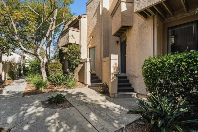 a house with a tree in front