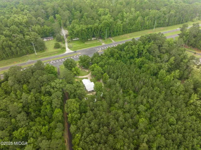 a view of a field with an outdoor space