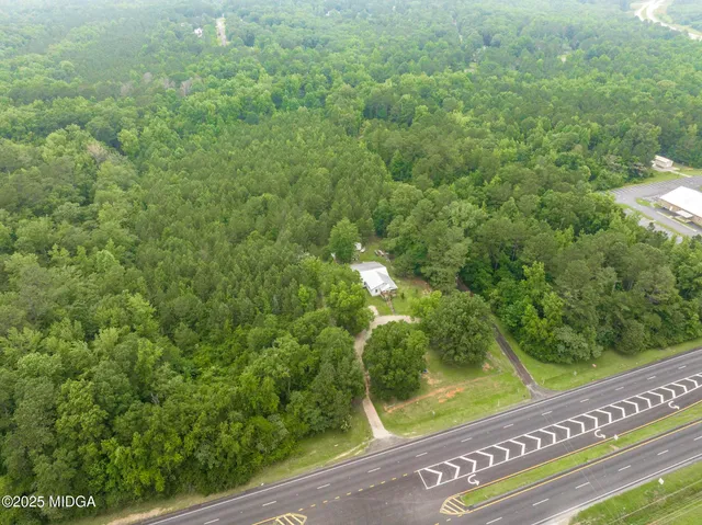 a view of a yard from a balcony