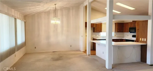 a view of hallway with washer and dryer