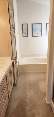 a view of a hallway with stairs