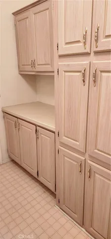 a view of a closet with cabinet