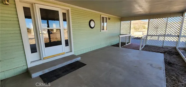 a view of livingroom with furniture and windows