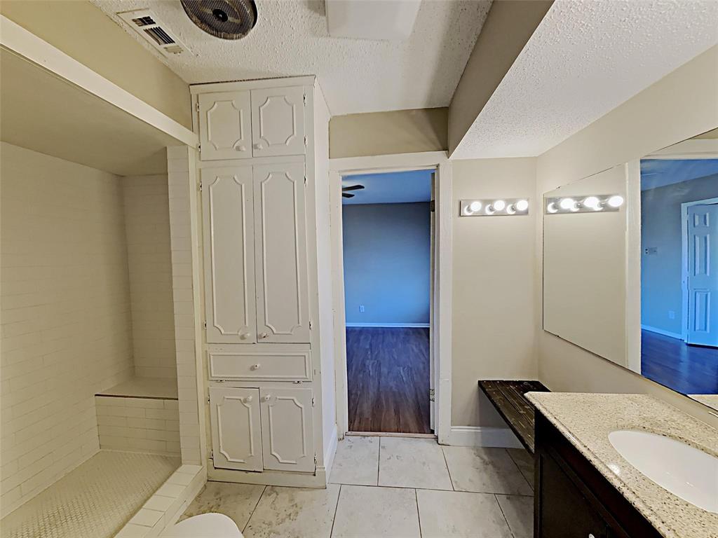 2330 Farm To Market Road 1387 Midlothian, TX 76065 - Photo 13 of 17 a bathroom with a sink and a mirror