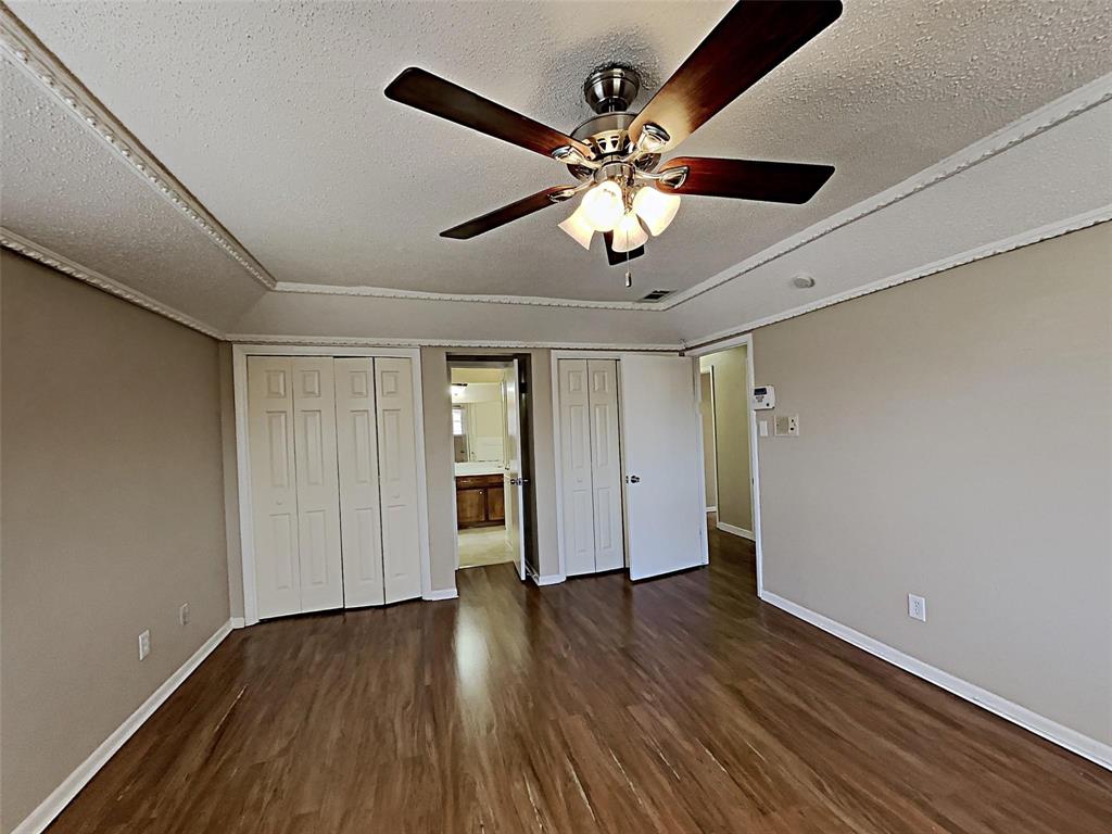 2330 Farm To Market Road 1387 Midlothian, TX 76065 - Photo 14 of 17 a view of a big room with wooden floor and windows
