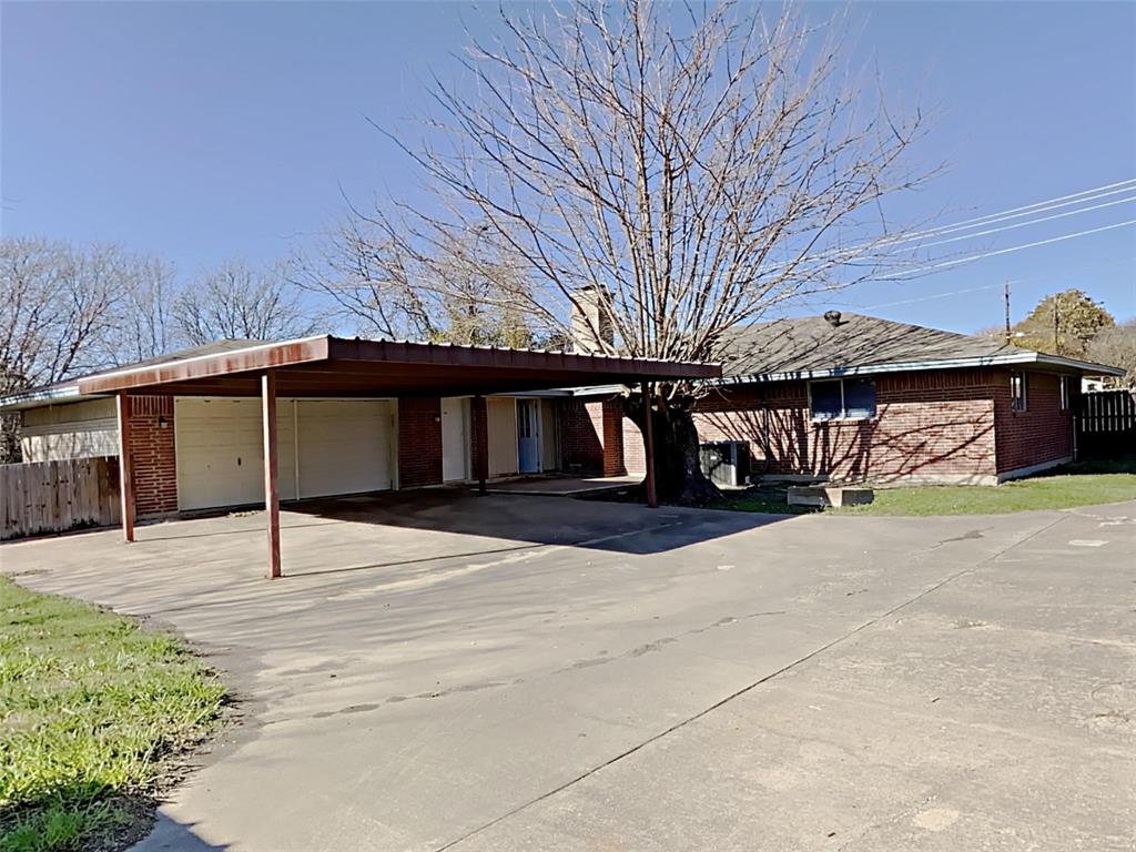 2330 Farm To Market Road 1387 Midlothian, TX 76065 - Photo 16 of 17 a street view with large trees