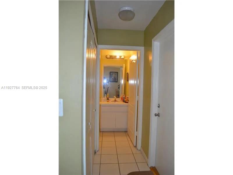 7132 Southwest 158th Path Miami, FL 33193 - Photo 7 of 21 a view of a hallway