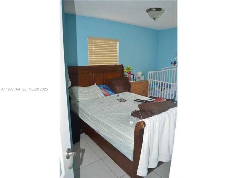 7132 Southwest 158th Path Miami, FL 33193 - Photo 8 of 21 a dinning room with a table and chairs