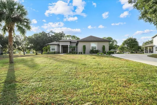 a view of a house with a swimming pool