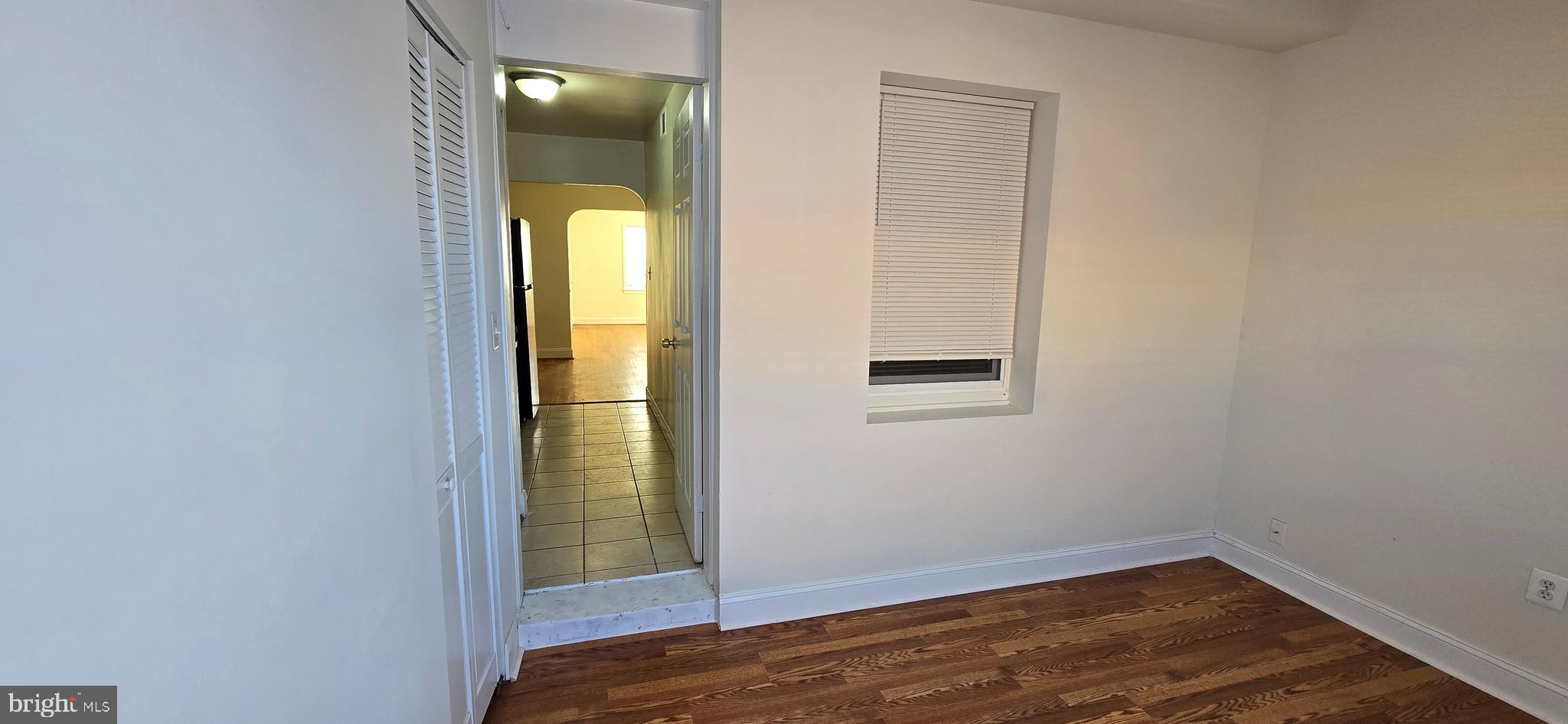 1516 F Street Northeast, Unit 3 Washington, DC 20002 - Photo 11 of 14 a view of an empty room with closet and mirror