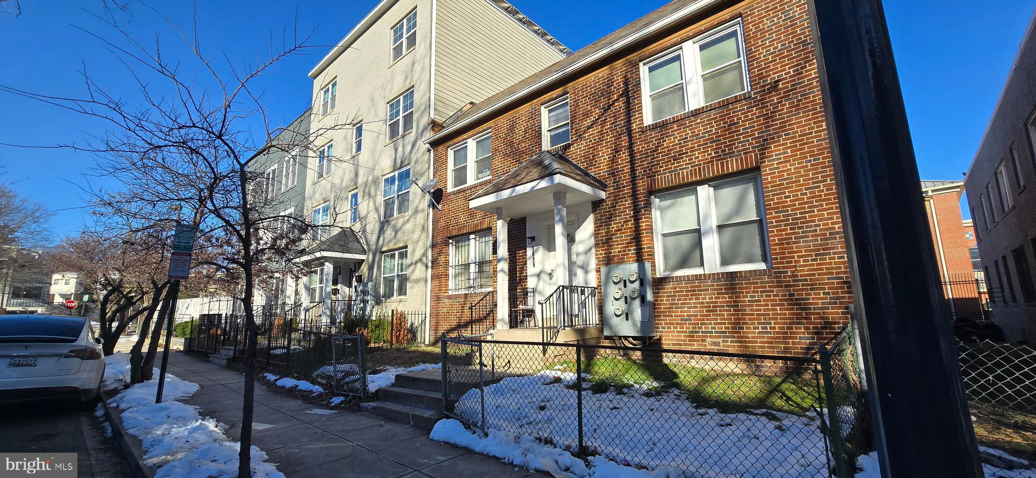 1516 F Street Northeast, Unit 3 Washington, DC 20002 - Photo 13 of 14 a view of brick building with many windows