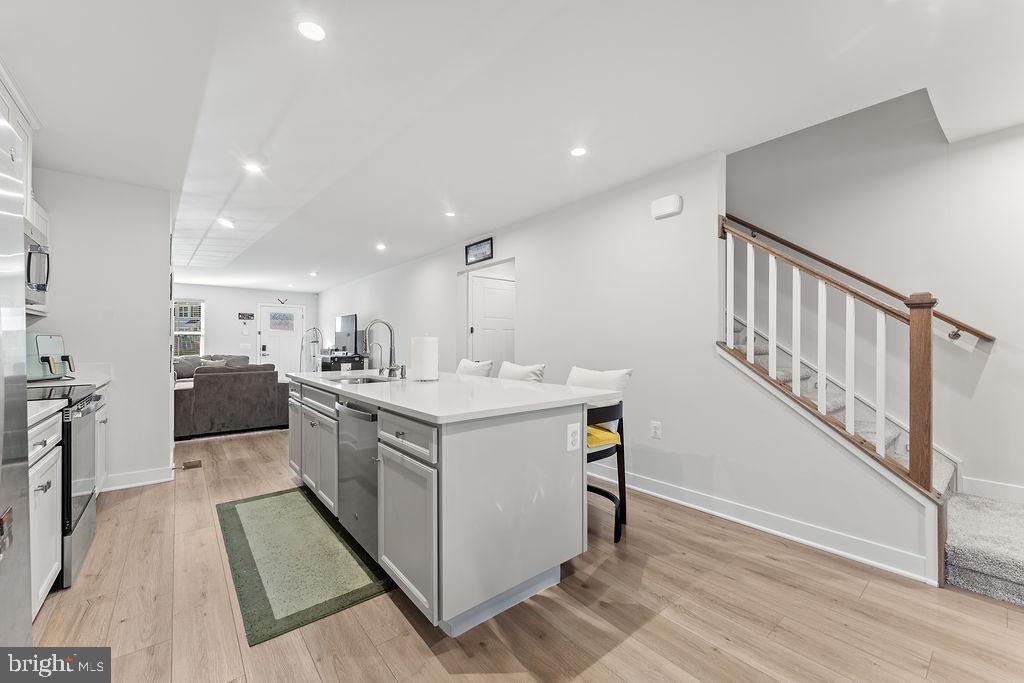 18368 Centennial Circle Ruther Glen, VA 22546 - Photo 14 of 45 a kitchen with a sink and cabinets