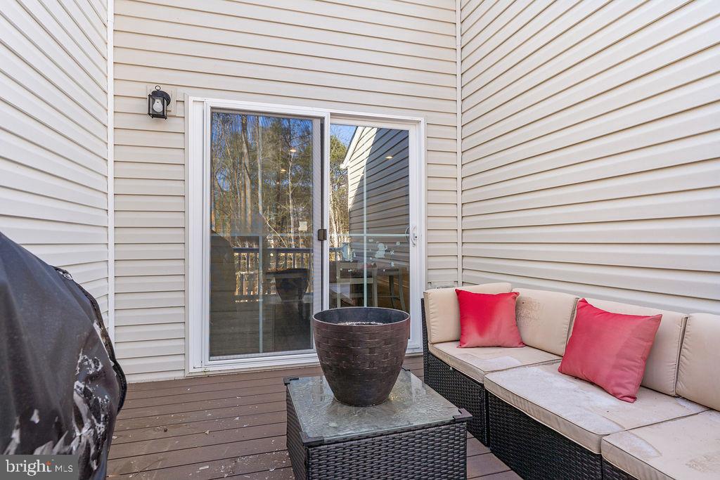 18368 Centennial Circle Ruther Glen, VA 22546 - Photo 21 of 45 a view of a couches in patio of the house