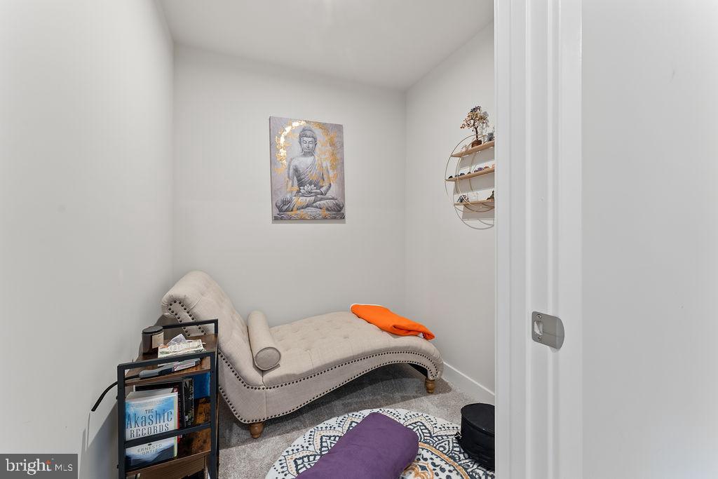 18368 Centennial Circle Ruther Glen, VA 22546 - Photo 29 of 45 a bedroom with a bed and a couch