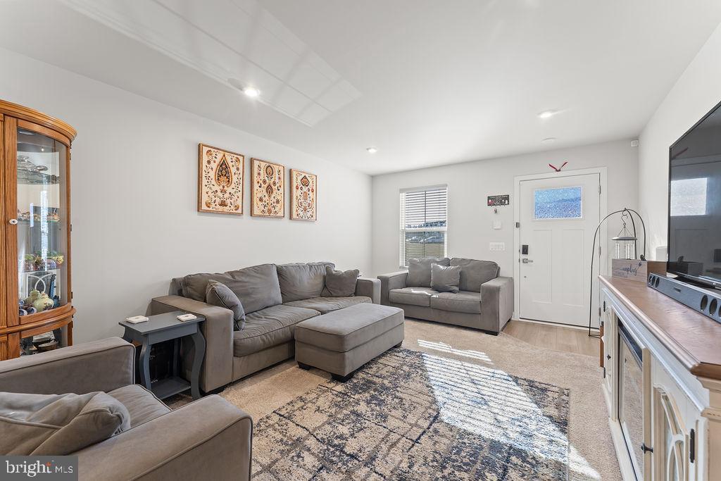 18368 Centennial Circle Ruther Glen, VA 22546 - Photo 3 of 45 a living room with furniture and a couch