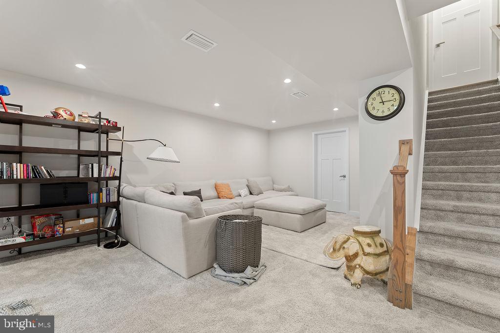 18368 Centennial Circle Ruther Glen, VA 22546 - Photo 34 of 45 a living room with furniture a window and wall