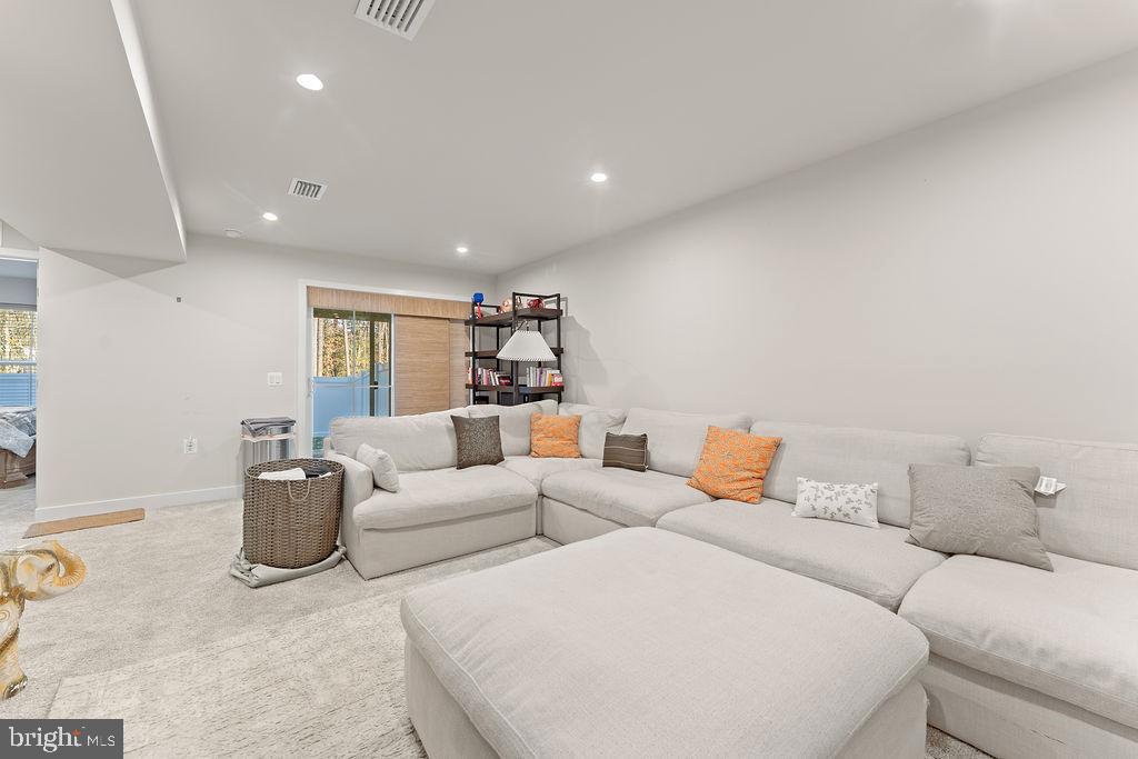 18368 Centennial Circle Ruther Glen, VA 22546 - Photo 35 of 45 a living room with furniture and a couch