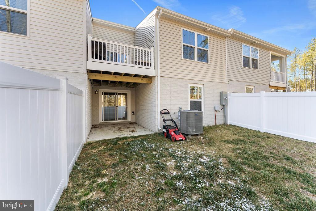 18368 Centennial Circle Ruther Glen, VA 22546 - Photo 41 of 45 a view of a house with backyard