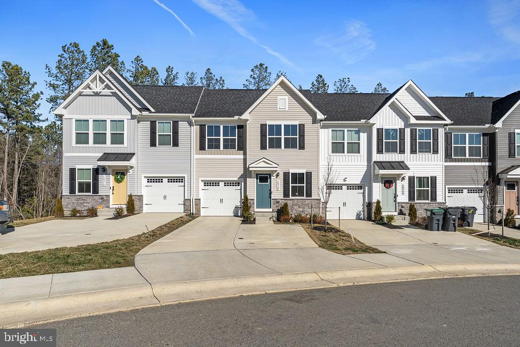 18368 Centennial Circle Ruther Glen, VA 22546 - Photo 43 of 45 a view of multiple houses with a street