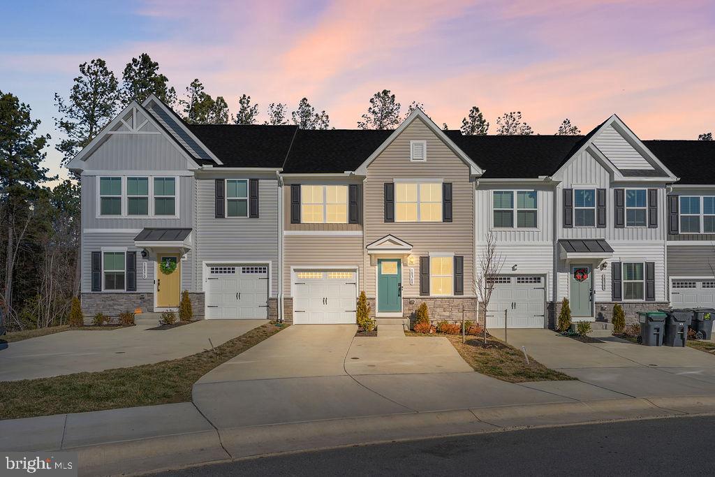 18368 Centennial Circle Ruther Glen, VA 22546 - Photo 44 of 45 a front view of a house with a yard