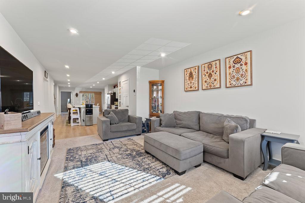 18368 Centennial Circle Ruther Glen, VA 22546 - Photo 5 of 45 a living room with furniture and a flat screen tv