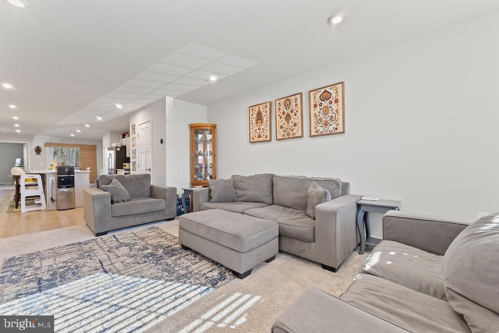 18368 Centennial Circle Ruther Glen, VA 22546 - Photo 6 of 45 a living room with furniture and a couch