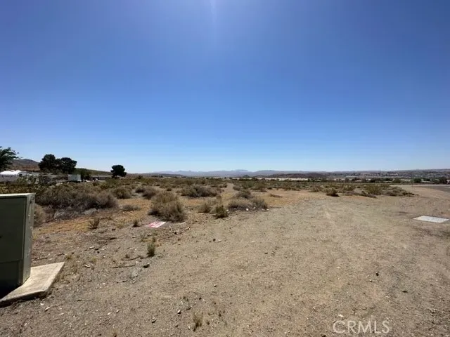 an aerial view of beach and building
