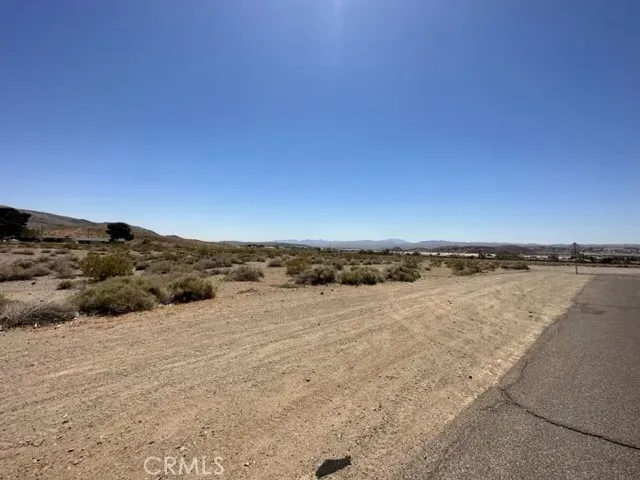 a view of a large body of water and mountain