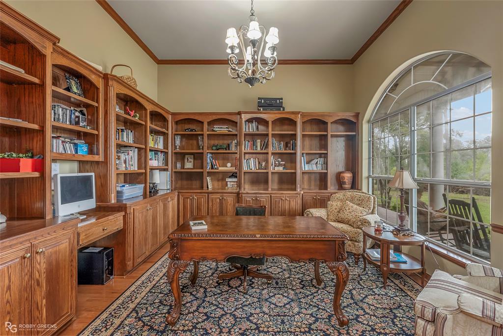 400 Crouch Road Benton, LA 71006 - Photo 12 of 40 Office featuring light wood-style floors, crown molding, and a chandelier