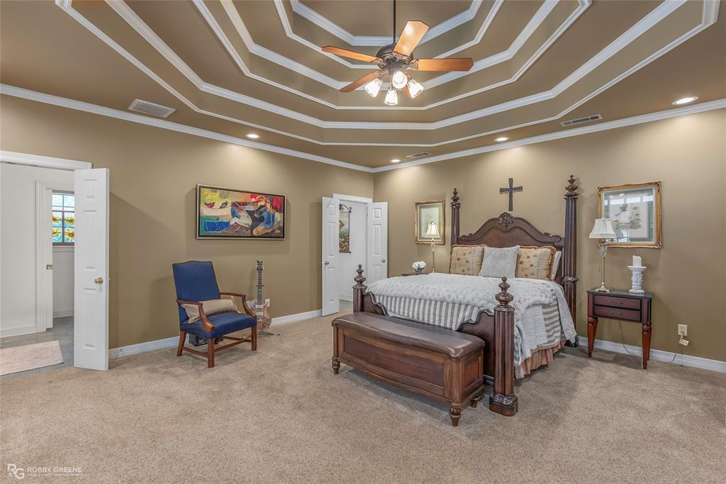 400 Crouch Road Benton, LA 71006 - Photo 22 of 40 Living room with french doors, wood finished floors, ornamental molding, a desk, and a ceiling fan