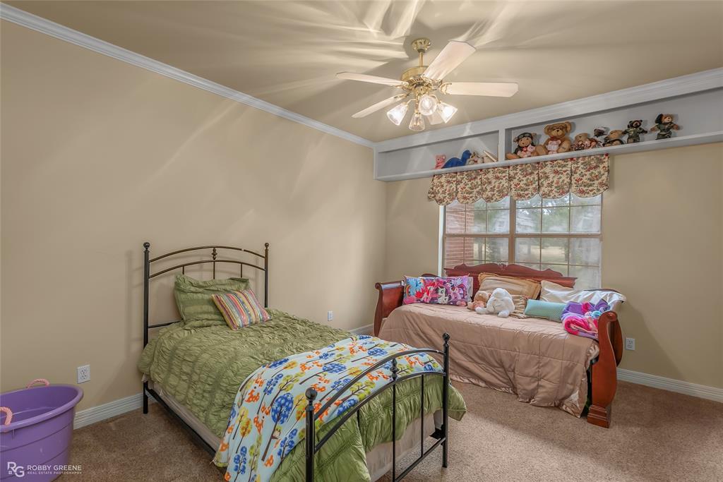 400 Crouch Road Benton, LA 71006 - Photo 28 of 40 Bedroom featuring light carpet, ornamental molding, and a ceiling fan